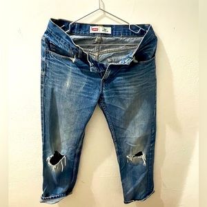 Ripped classic blue Levi 505 jeans